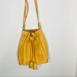 Yellow leather tassel cross body bag